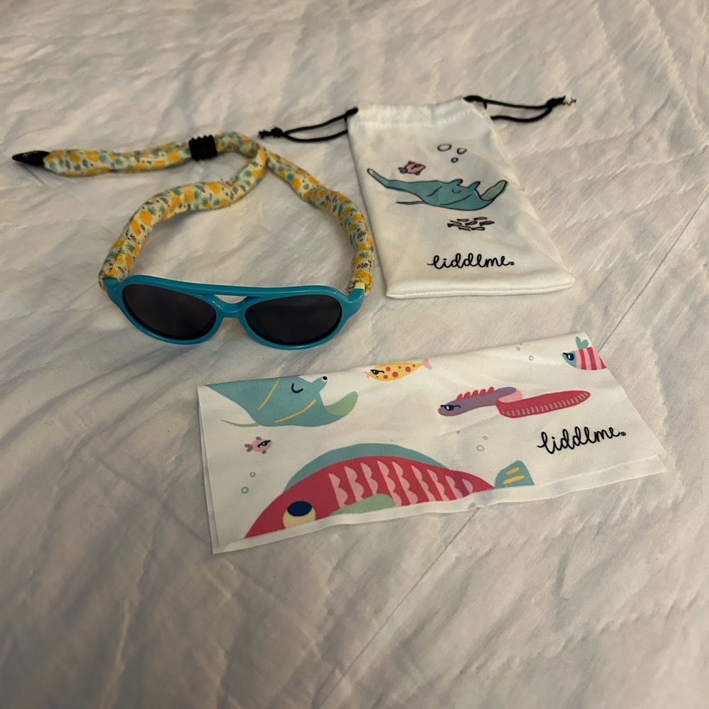 Liddlme baby polarized sunglasses with accessories.